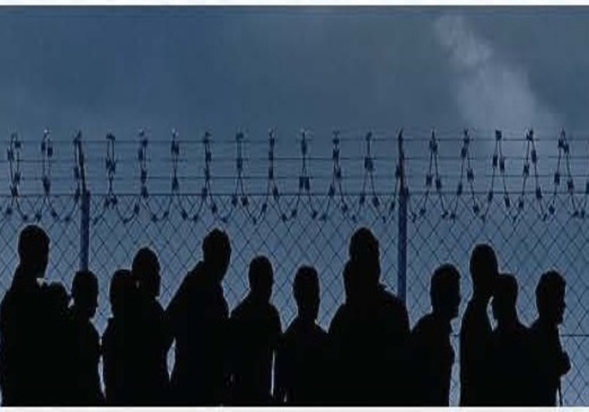 Image enclosed with wires, in a situation of separation or marginality.